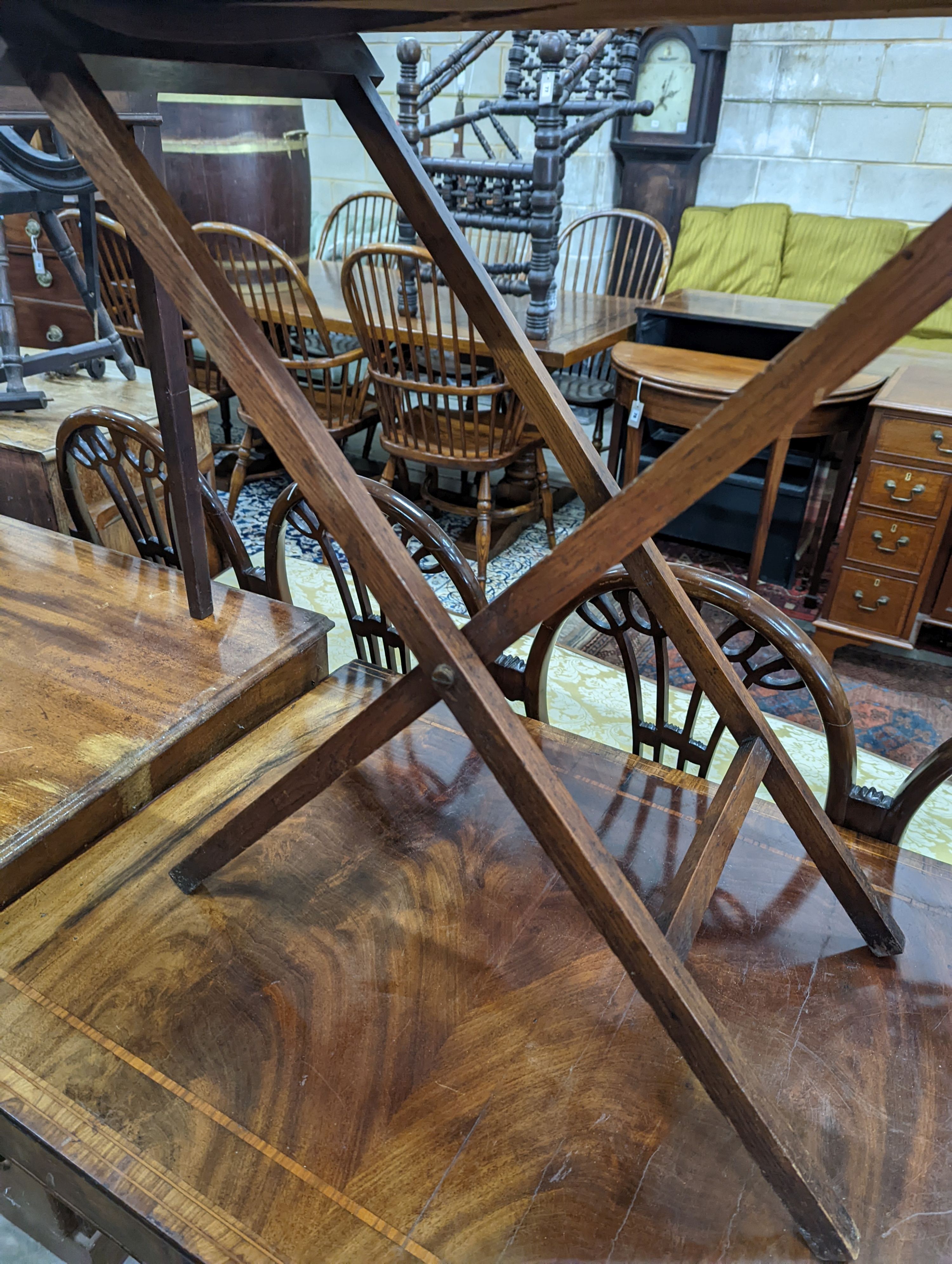A Victorian rectangular oak butler's tray on folding stand, width 75cm, depth 44cm, height 80cm